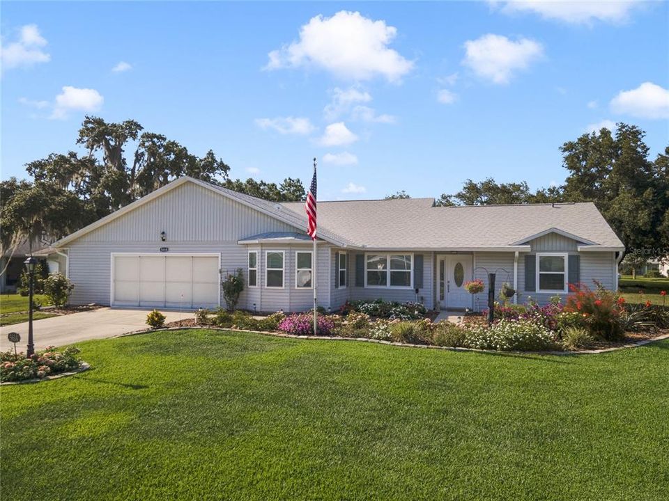 Front of Home w/ Custom Garden & Flower