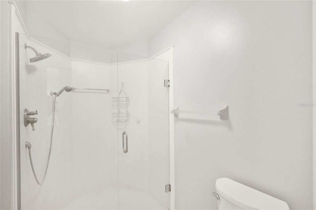 Upgraded Shower w/ Glass Doors
