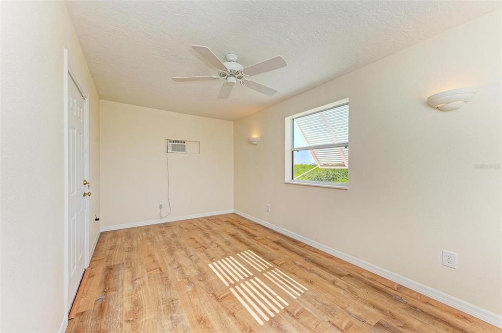 bonus room at rear with private entrance, perfect office/den, window unit.