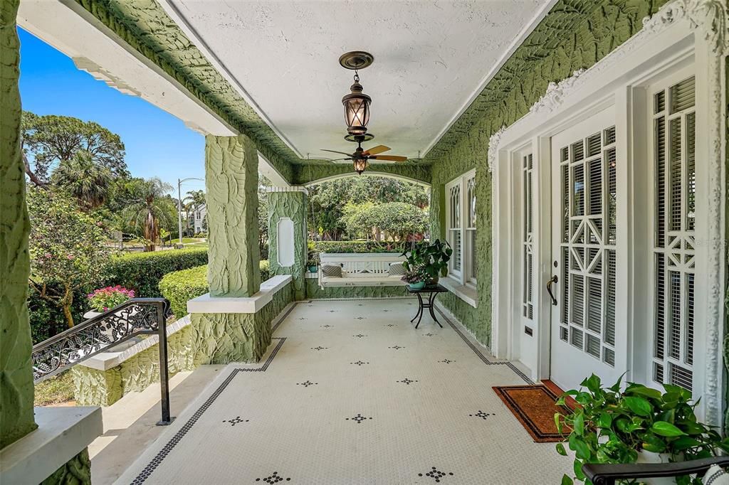 Enjoy swinging the afternoon away on this front porch!