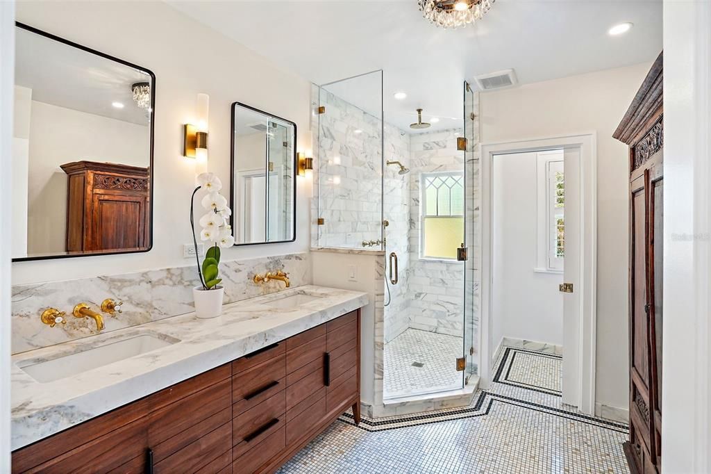 Main bath - double vanity, walk in shower and private water closet
