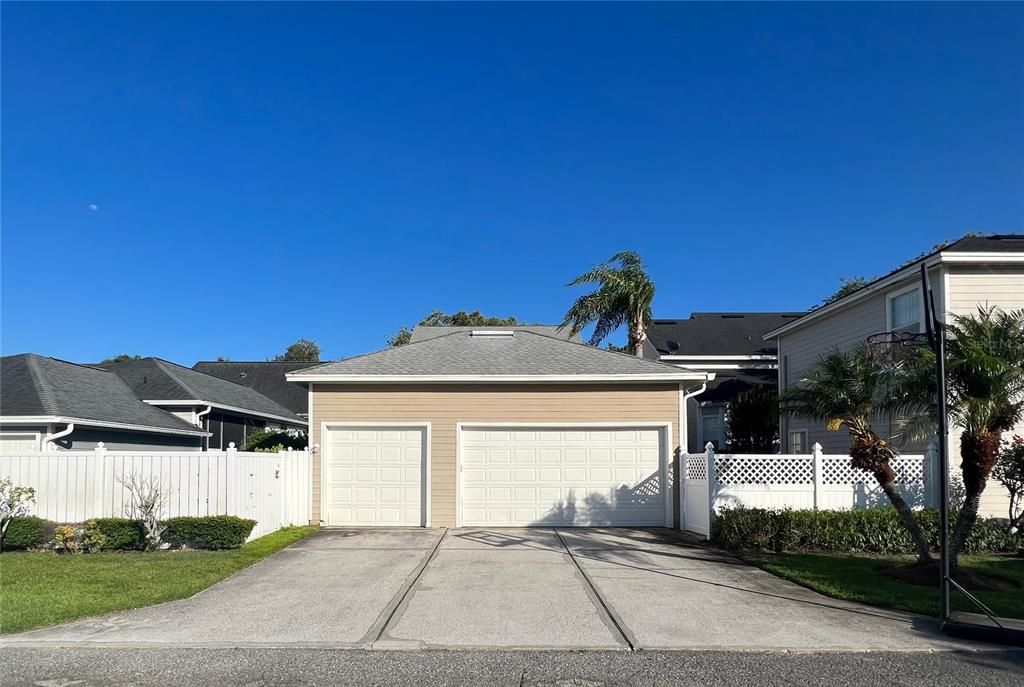 3 Car Garage with additional parking pad