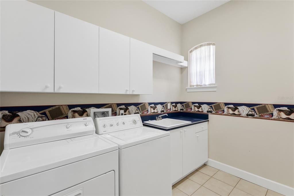 Laundry room sink and storage