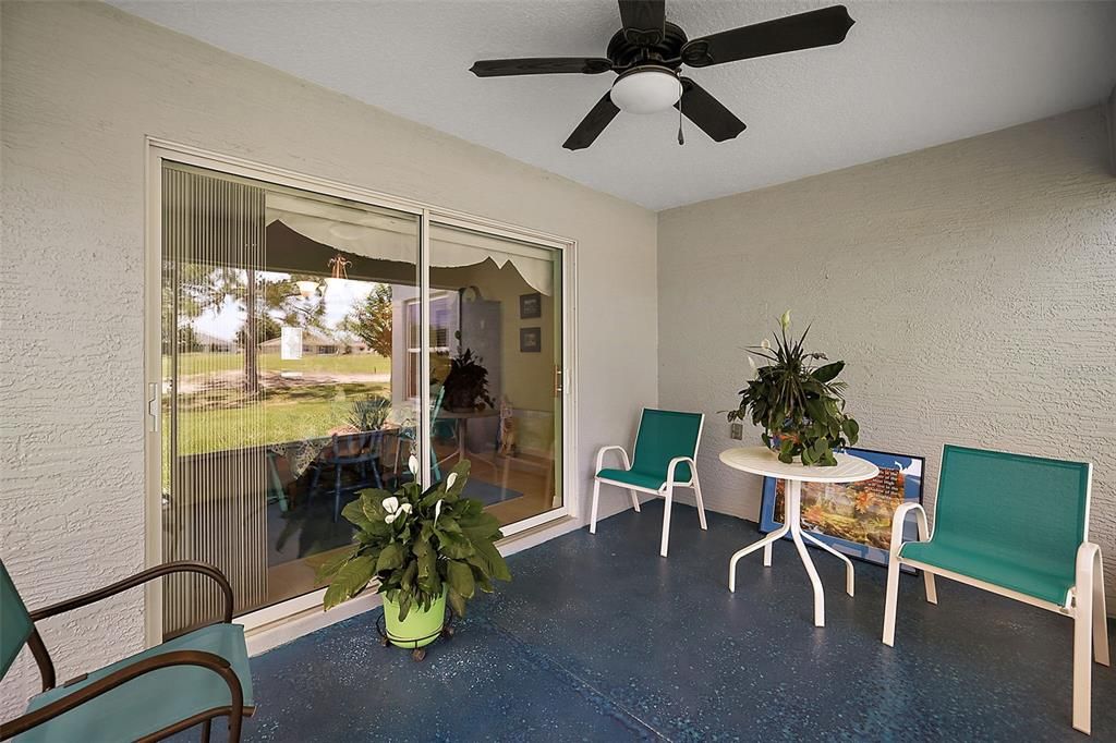 Lanai , Has Patted floor. Sliding Doors are double pane with Vertical Blinds