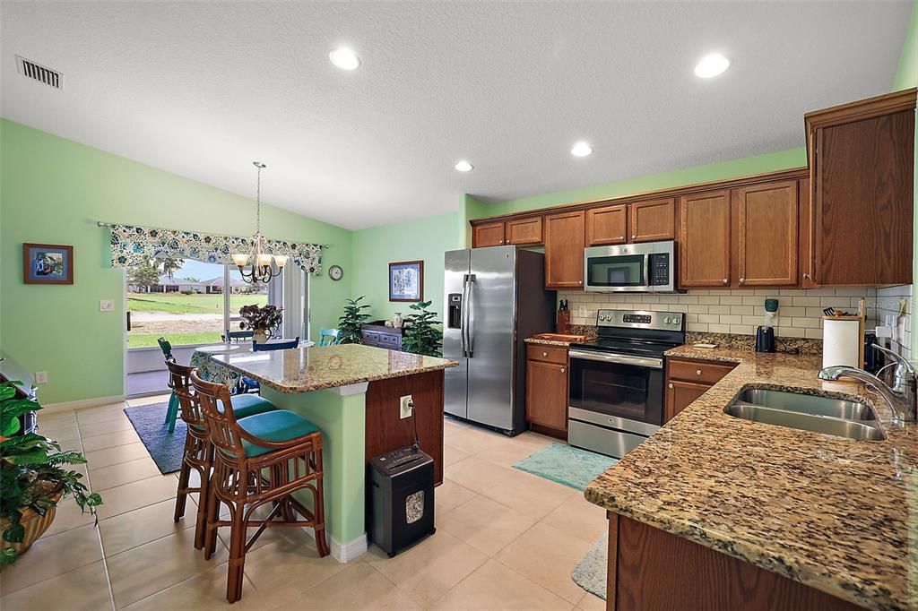 Spacious Kitchen for a 1600 sq ft house. Good size Island with storage and seating for 2.