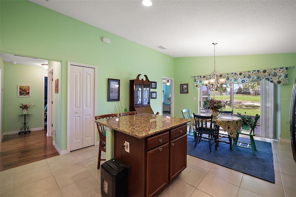 Ceramic Tile in Kitchen, Both Baths, Foyer and Utility Room