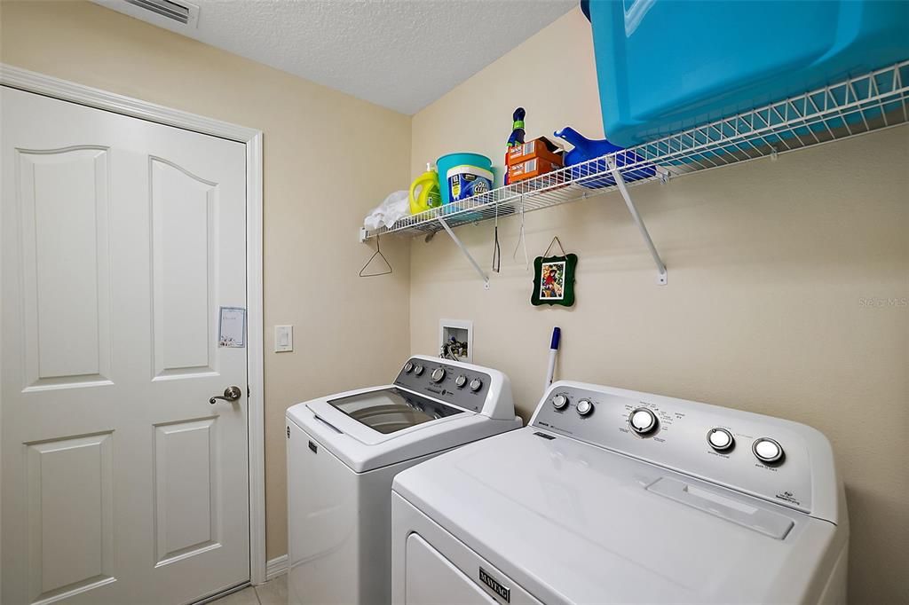 Roomy Utility Room. Washer/ Dryer stay with hous.