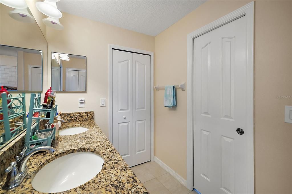 Primary en suite, Spacious Walk IN Closet, Private W/C and Linen Closet, Double Sinks , Medicine Cabinets Beautiful Granite Counter Tops.