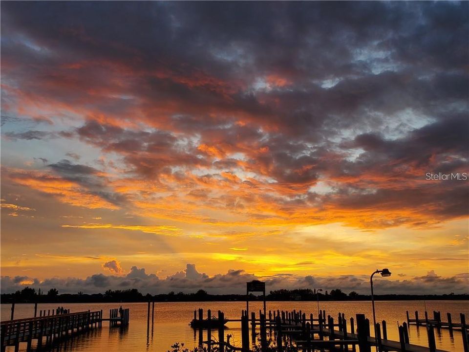 Spine tingling sunsets over this area of Osprey's Intracoastal Waterway are but 1.8 miles to the west,.. "door to explore"...