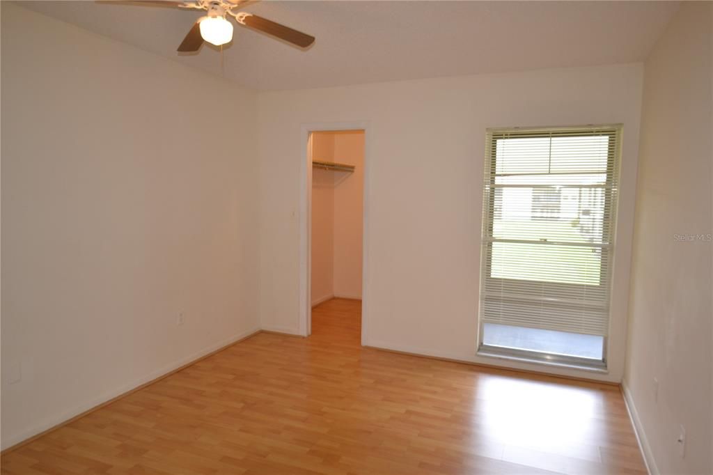 Bedroom with one of two closets