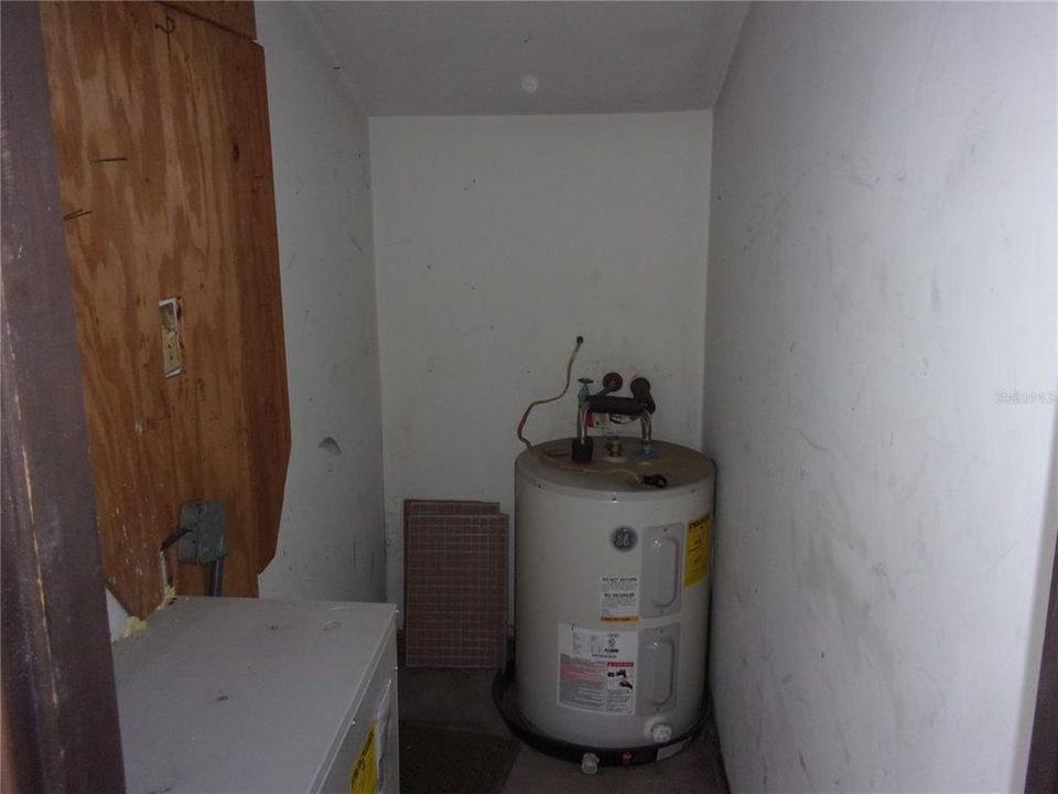 Outside storage water heater and AC