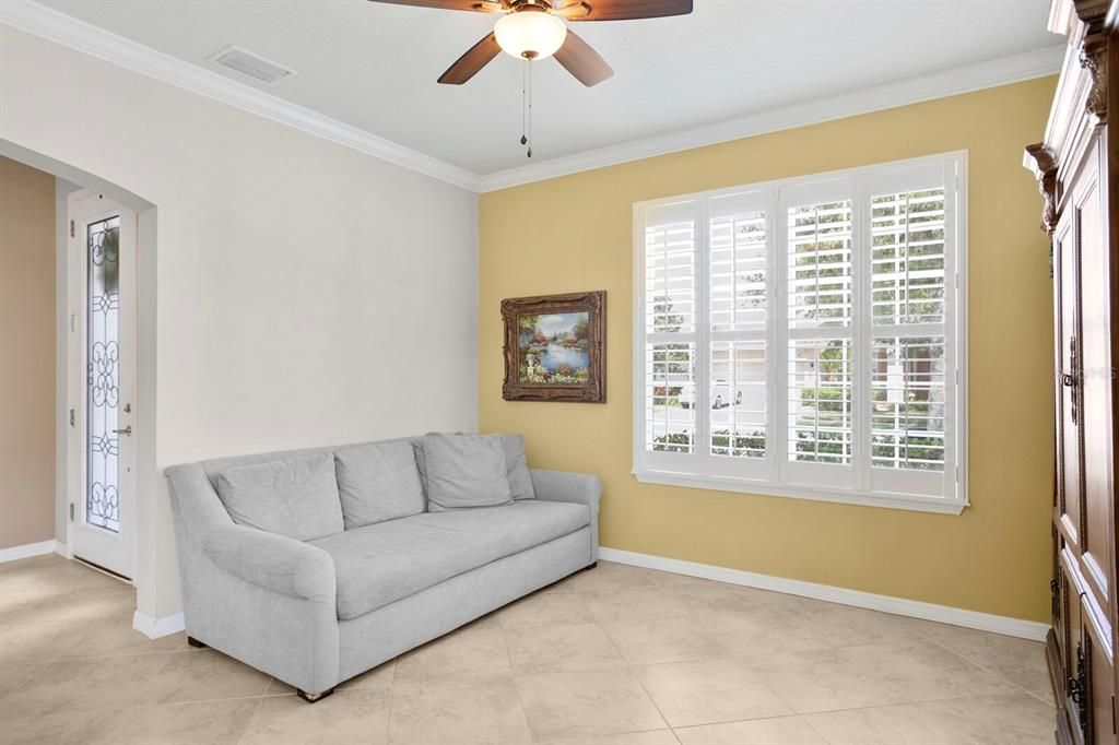 You'll find upgraded plantation wood shutters throughout the home