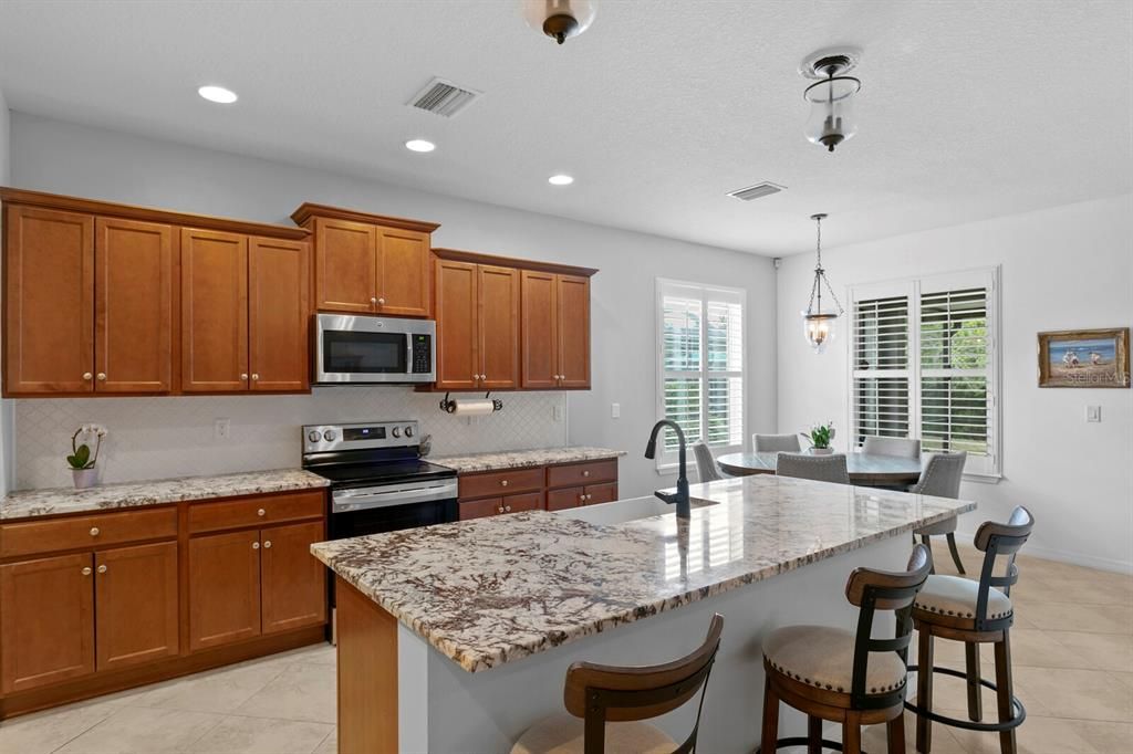 Upgraded granite counters and large breakfast bar