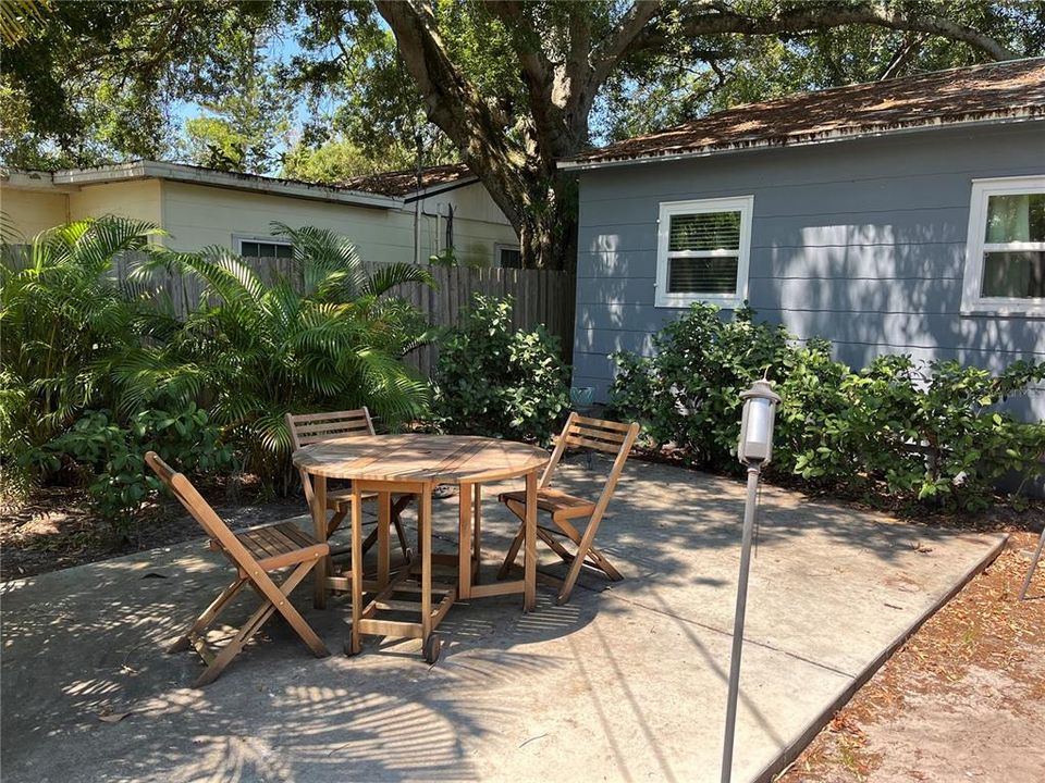 Outdoor patio for table and lounge chairs