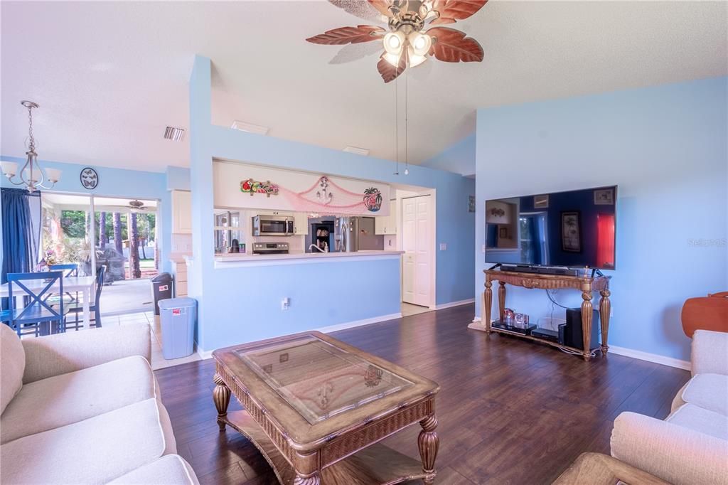 The family room is open to the kitchen and breakfast nook.