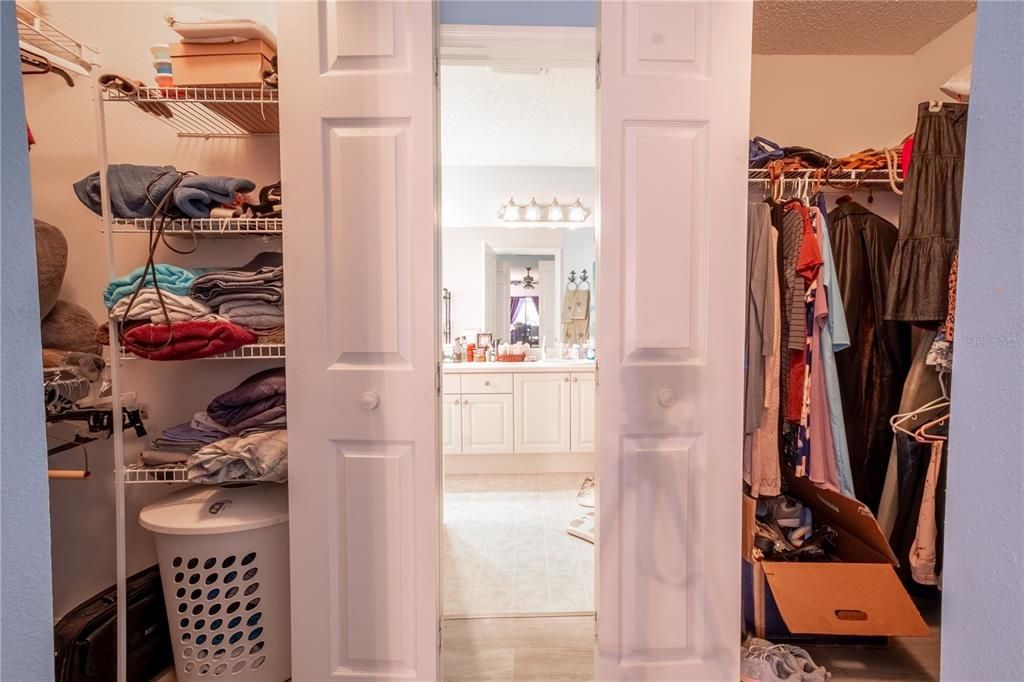 The primary bedroom has 2 walk-in closets