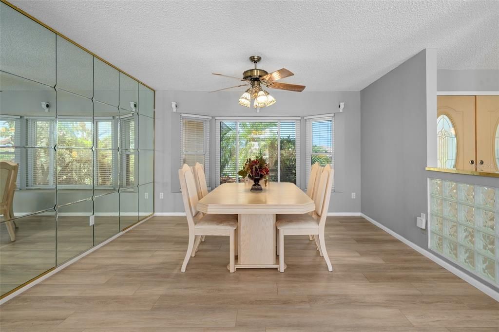 Dining Room.  or Music room with a baby Grand Piano.