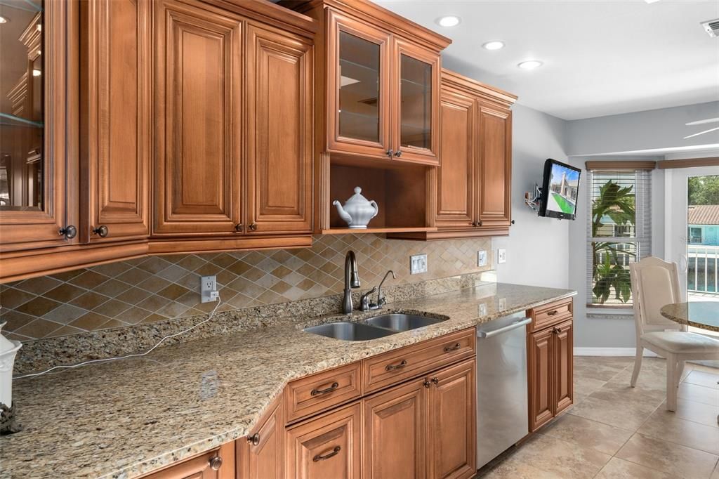 Lots of cooking space!!   Table matching granite countertop.