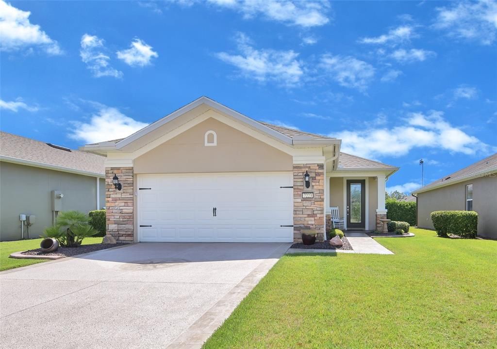 Front View with Garage Door Down and Premium Epoxied Driveway and Walkway