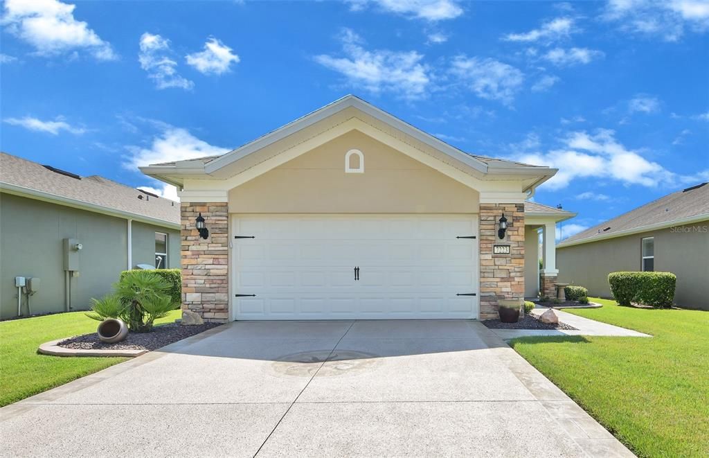 Front View with Garage Door Down