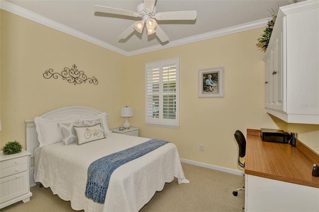 Guest Bedroom with built-in Desk & Cabinets