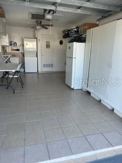 Garage with storage and washer and dryer