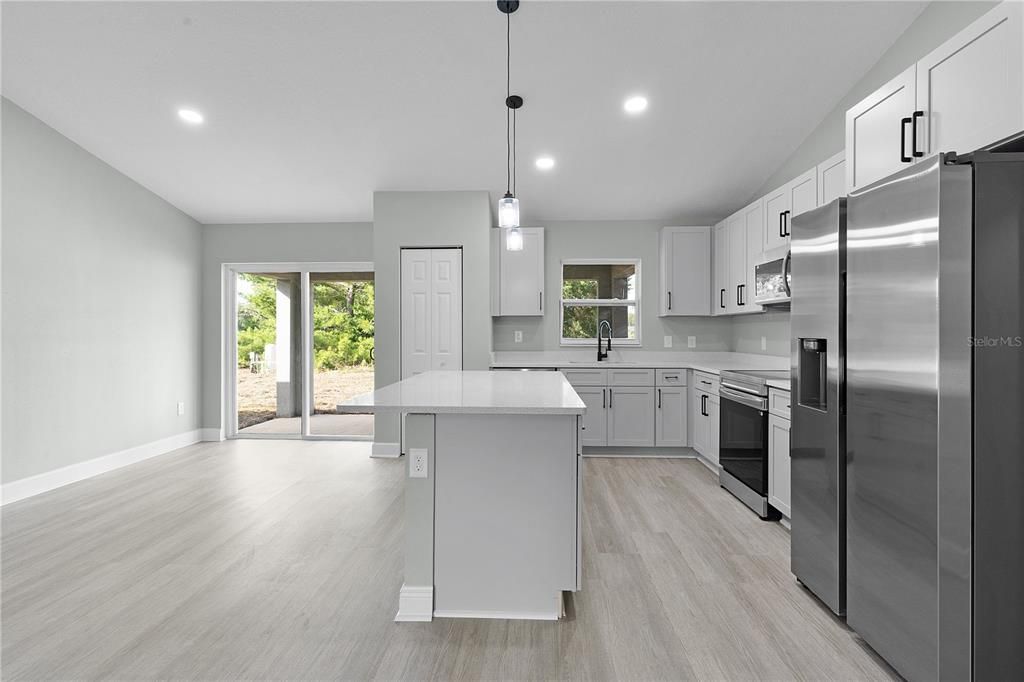 Dining room and kitchen areas