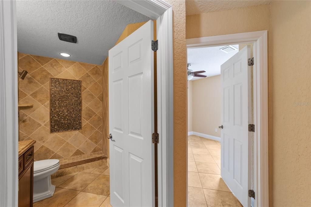 Hallway with guest bathroom.