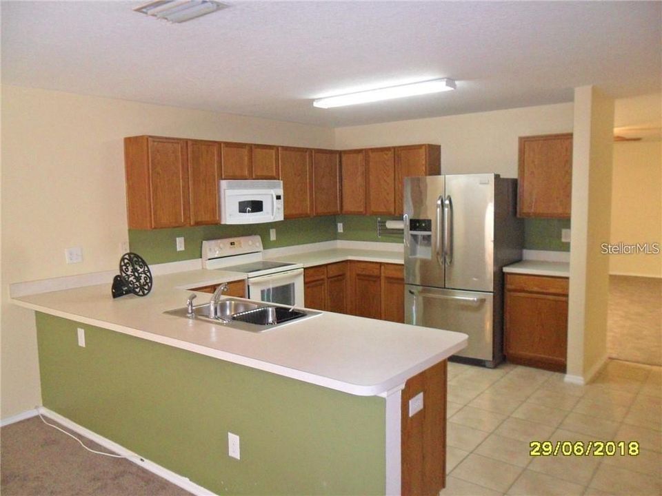 Open Kitchen overlooks Great Room