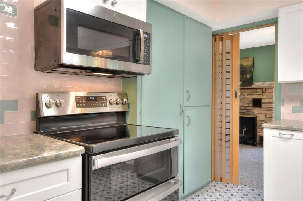 breakfast bar opening to dining room