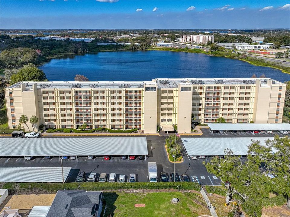 AERIAL VIEW OF CONDO, PARKING AREA, SPRING LAKE & VIEW TOWARDS THE NORTH