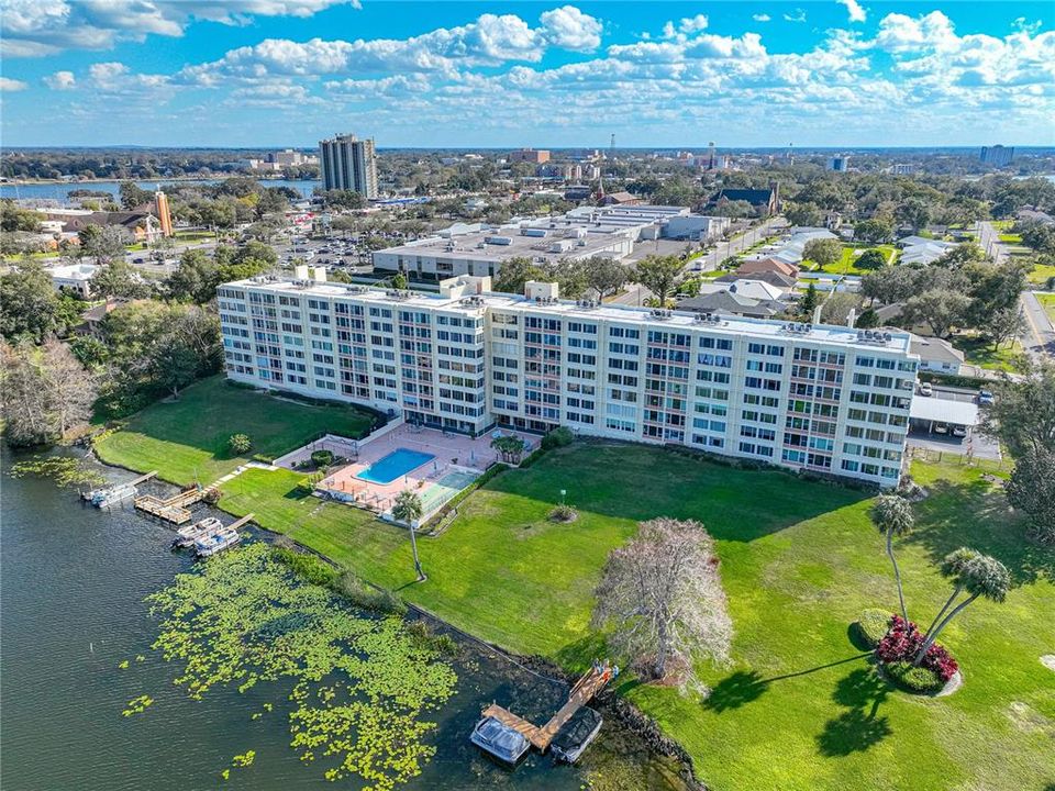 SPRING LAKE TOWERS COMPLEX OVERLOOKING SPRING LAKE. VIEW OF DOWNTOWN WINTER HAVEN IN THE DISTANCE.