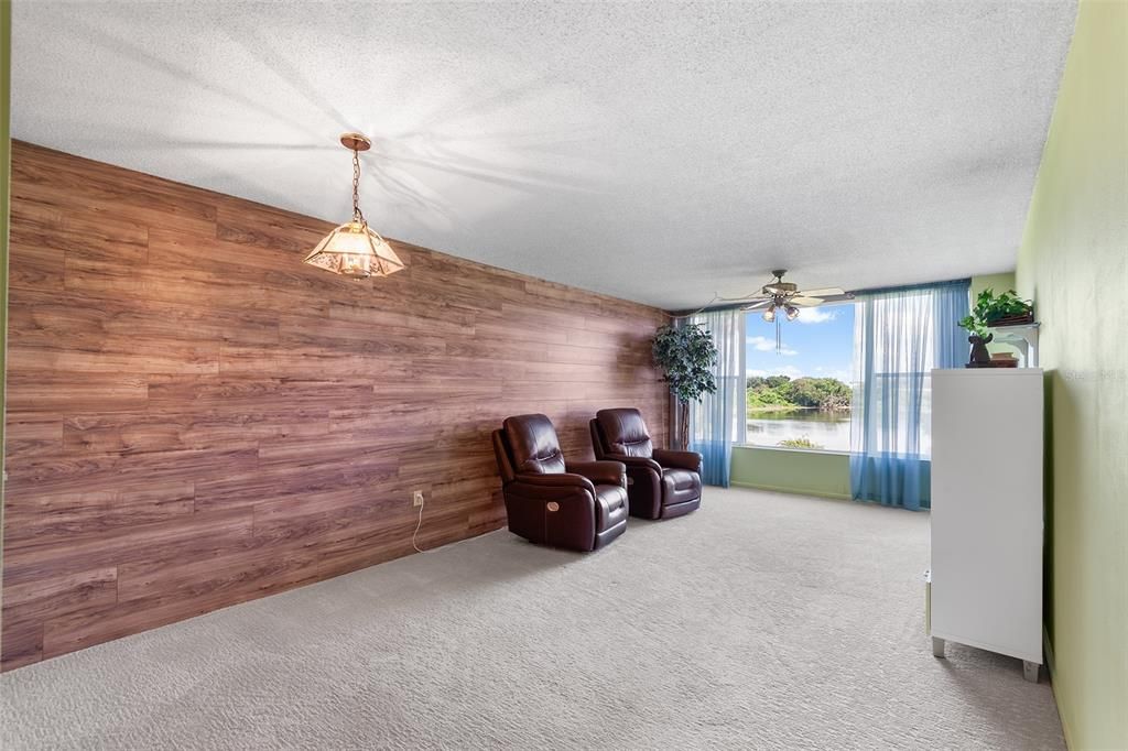 VIEW INTO DINING AND LIVING ROOM AREA. NOTE THE LAKE VIEW!