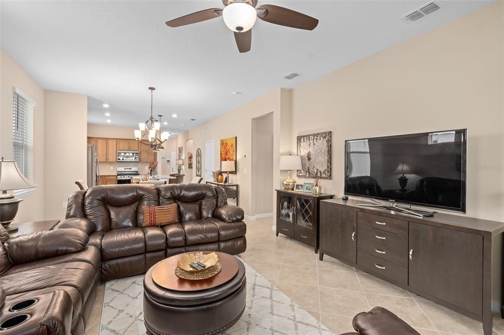 Family / Gathering Room with a View of the Cafe and Kitchen