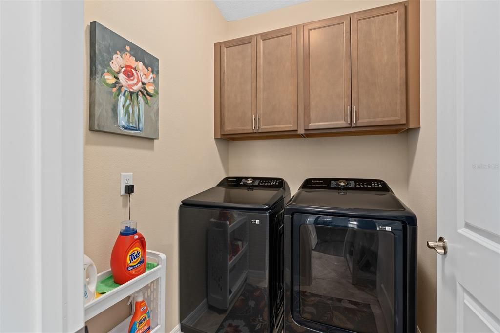 Laundry Room with Upgraded Upper Cabinetry for additional storage