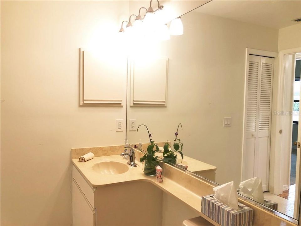 Laundry room inside unit and more storage.