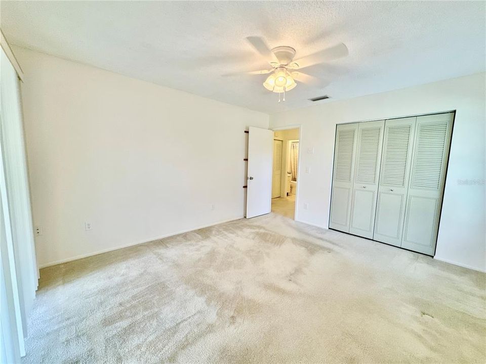 2nd bedroom with sliding glass doors to lanai