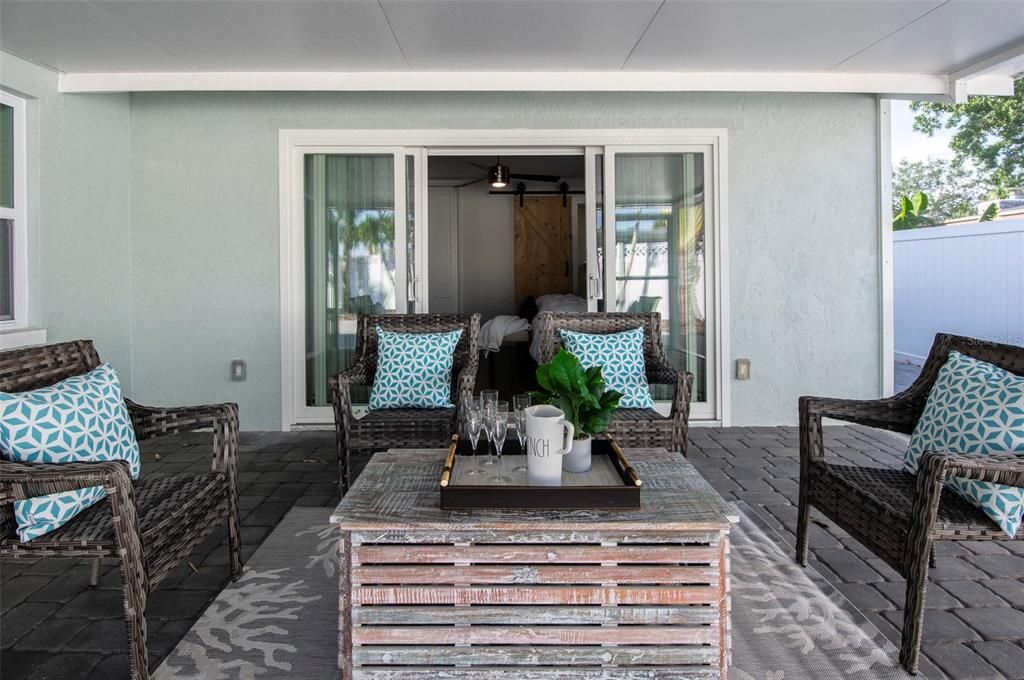 Screened sunroom and sliding door to Master bedroom