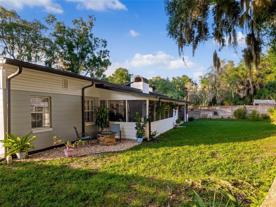 Lush green landscaping and fenced in backyard