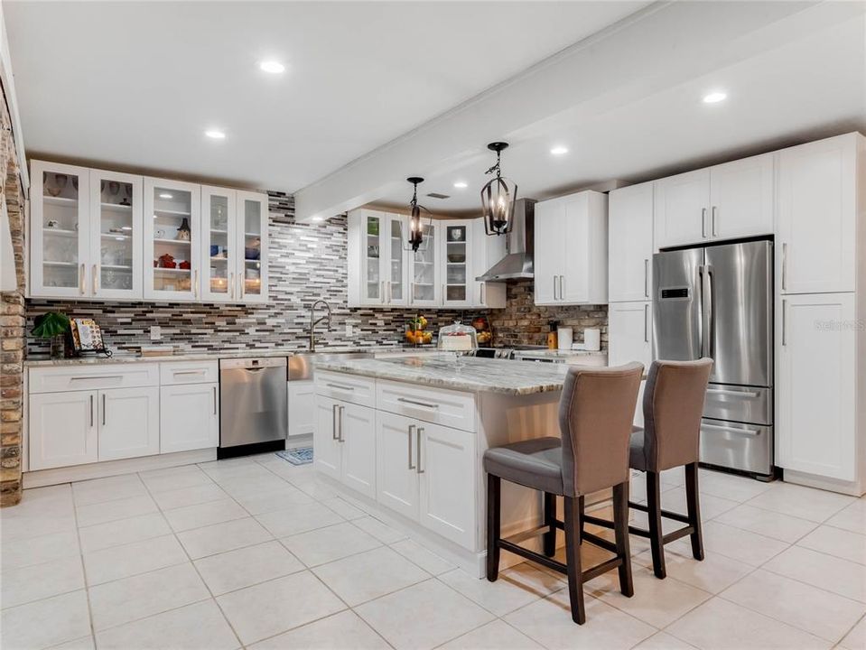 Glass Cabinets - Brick Accents