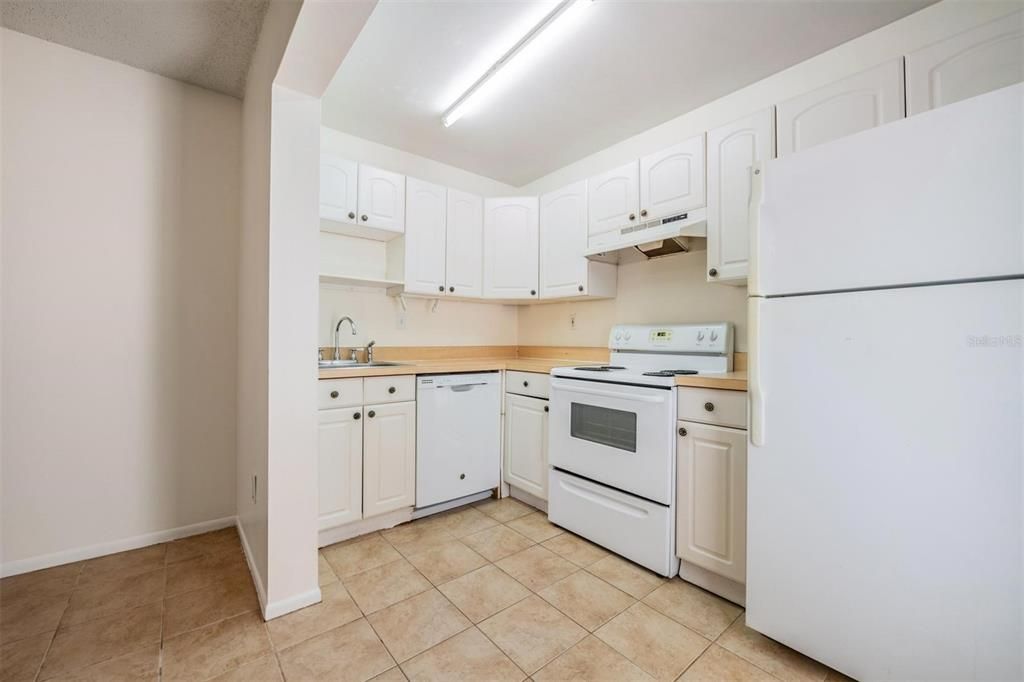 Kitchen opens to eating area and living room