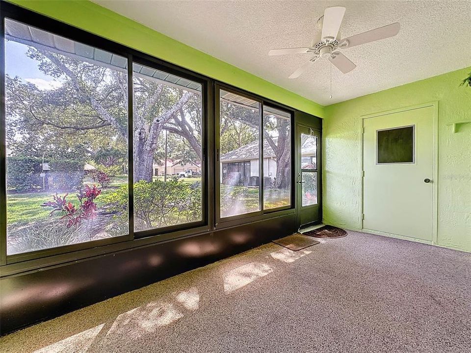 Enclosed Florida Room/Porch with washer/dryer closet