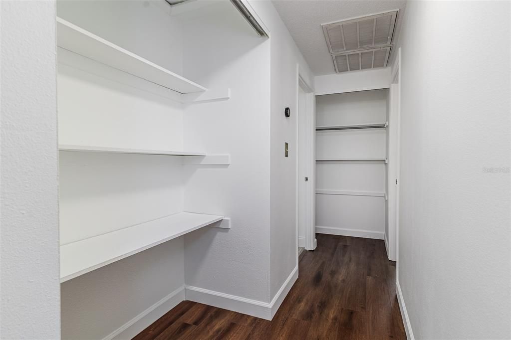 Hallway of bedroom with storage