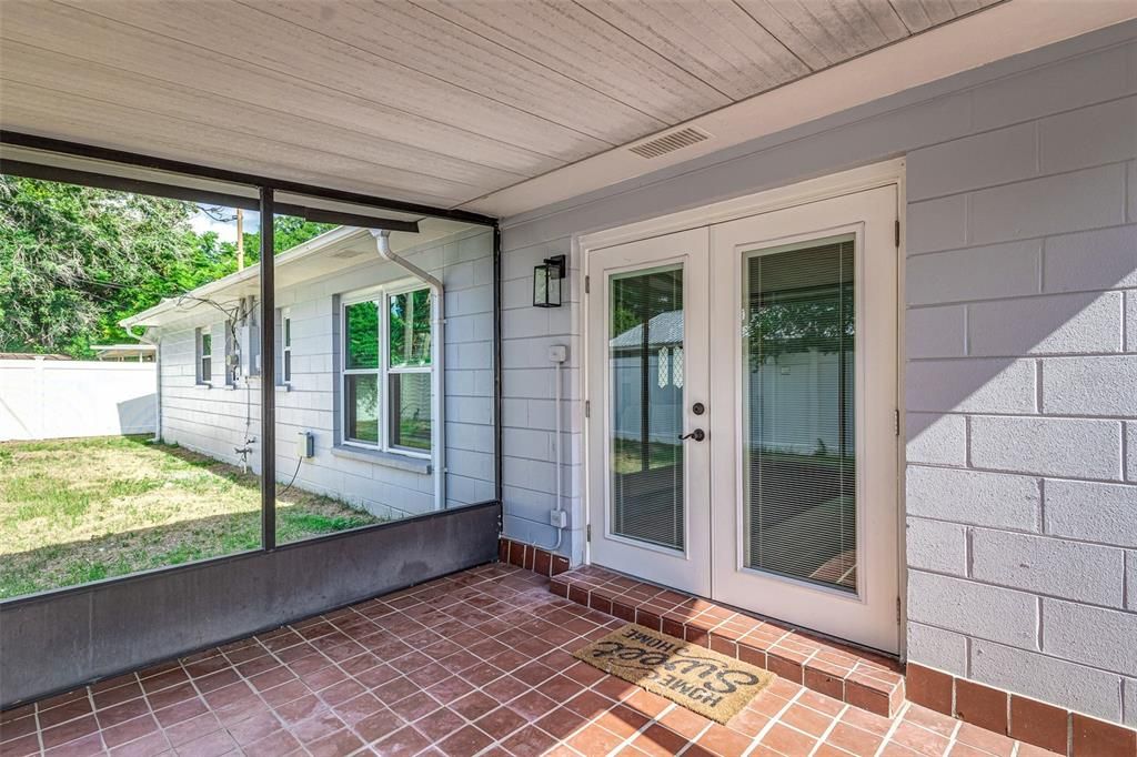 Screened lanai with French doors