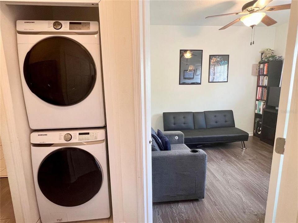 laundry closet with new(er) washer and dryer