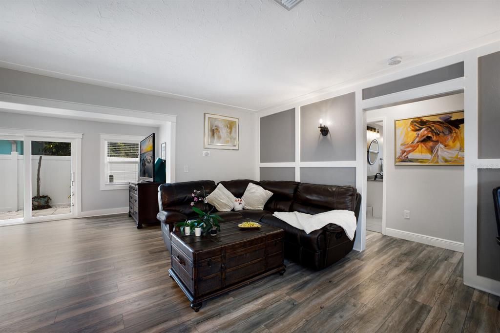 Luxury vinyl flooring extends throughout the home, with the exception of the bathrooms which have beautiful ceramic tile.