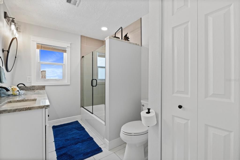 Second bathroom has a large linen closet.