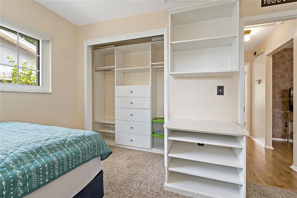 BUILT IN CLOSET ORGANIZING SYSTEM IN THE GUEST BEDROOM CLOSET!