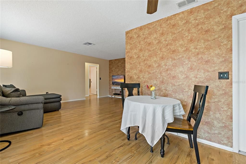 PERFECT DINING AREA IN BETWEEN KITCHEN & FAMILY ROOM!