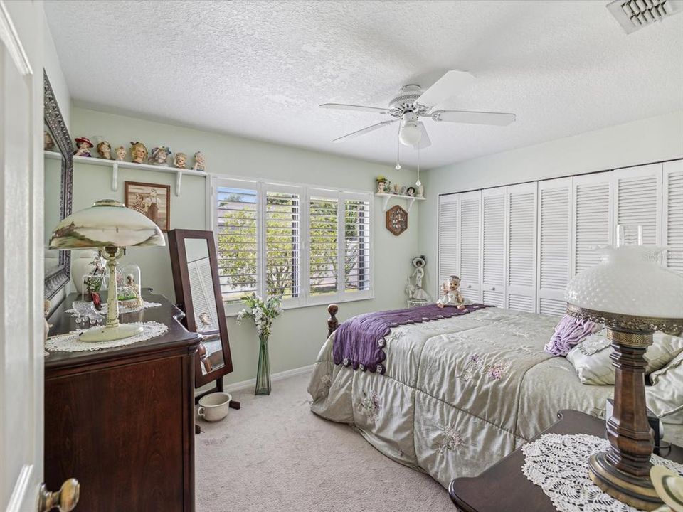 Beautiful large 2nd bedroom w/loads of closet space and beautiful plantation shutters.